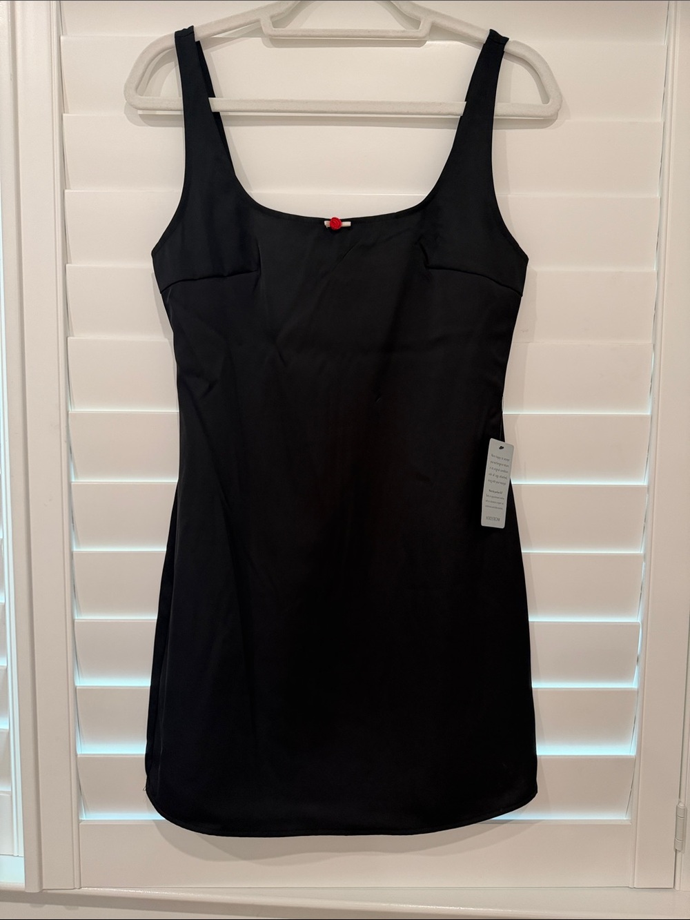Astr Black Dress with Subtle Red Thread Accent
